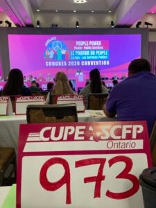 picture of 973 sign with background of Ontario Convention